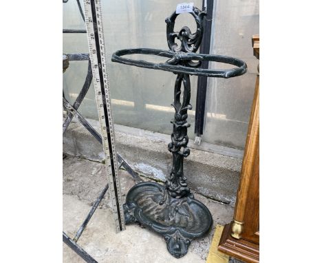 A VINTAGE CAST IRON UMBRELLA/STICK STAND WITH DRIP TRAY 