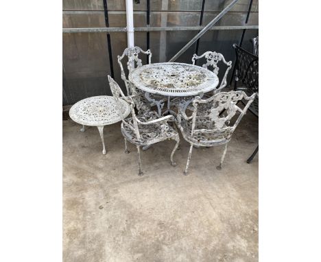 A VINTAGE CAST ALLOY BISTRO SET COMPRISING OF A ROUND TABLE, FOUR CARVER CHAIRS AND A COFFEE TABLE 