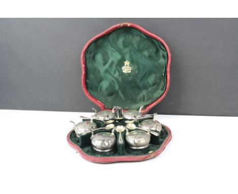 A cased set of six fully hallmarked sterling silver salts and six matched spoons.