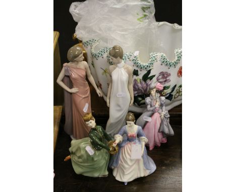 A group of figurines to include Royal Doulton Grace,Valerie, Worcester Masquerade and two Nao figures.