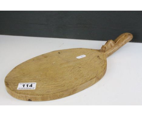 Mouseman Oak Cheese Board of oval form and mouse carved to handle, 38cms long