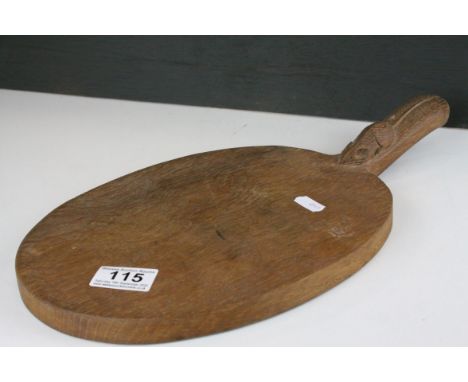 Mouseman Oak Cheese Board of oval form and mouse carved to handle, 39cms long