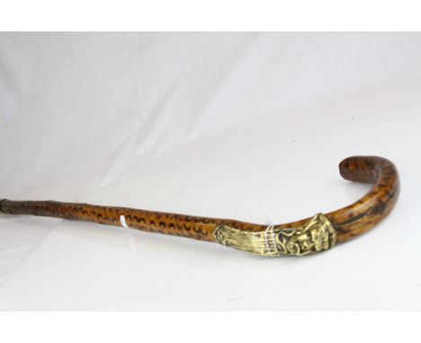 Folk Art Walking Stick with brass mounts with head surround with serpents