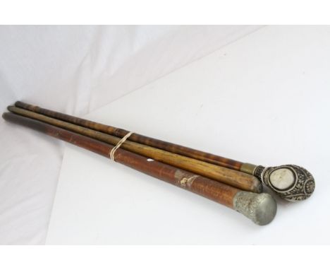 Walking Stick with Faux Ivory Handle marked Horatio Nelson, White Metal Handled Walking Stick and a Measure Walking Stick