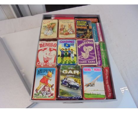 Box containing over 40 packs of Pepys Playing Cards including Famous Five, Dumbo, Rupert Bear, Just William, Pinocchio, Biggl