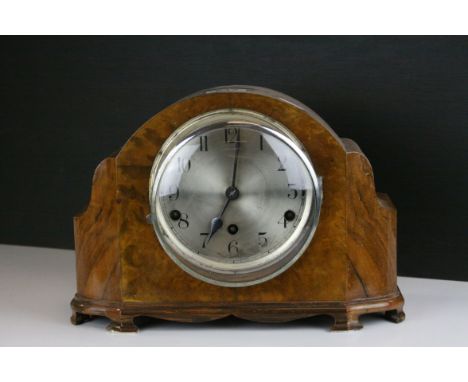 A walnut Art Deco walnut mantle clock with three train movement.