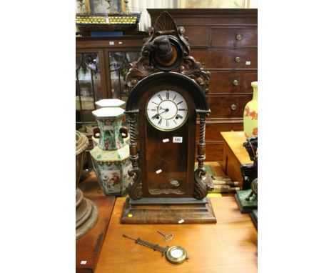 19th century Walnut Cased Regulator Mantle Clock, Carved Dog Mask to Pediment, the white enamel face with Roman Numerals, h.8