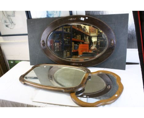 Three vintage oak framed wall mirrors