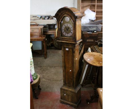 20th century Walnut Cased Grandmother Clock, the brass face with silver chapter ring having roman and Arabic numerals and mar