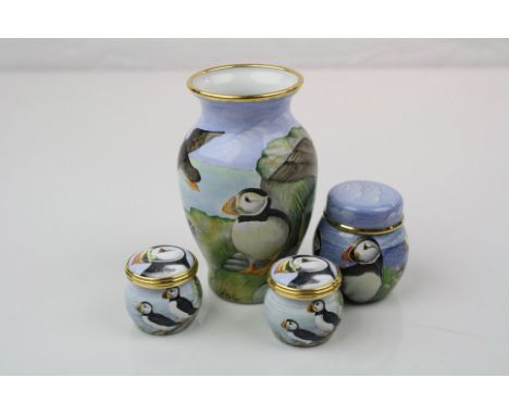 Four Elliot Hall Enamel collectables all with Puffin designs to include a small vase numbered 4/25, a small lidded jar number