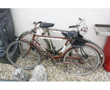 Vintage Triumph Traffic Master Bicycle plus a Raleigh Bicycle