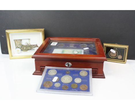 A cased set of Danbury Mint Queen Elizabeth II Commemorative coins and banknote complete with COA. together with two cased co