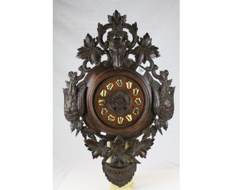 An early 20th century large black forest two train wall clock for repair.