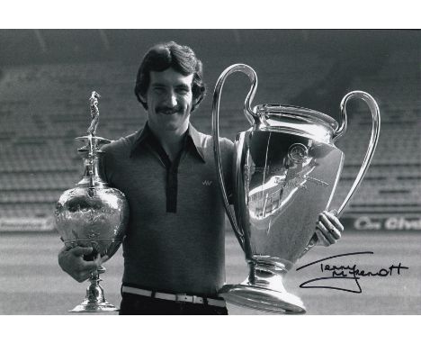 Autographed TERRY McDERMOTT 12 x 8 photo : B/W, depicting a superb image showing Liverpool's TERRY McDERMOTT posing with the 