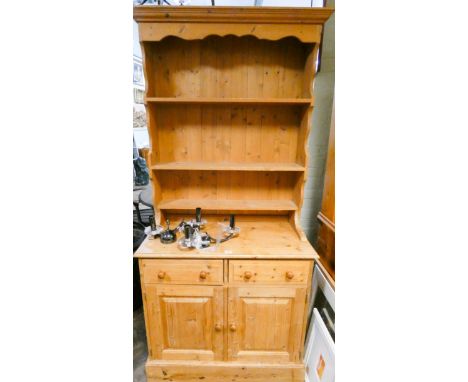 A pine kitchen dresser with shelf back, drawers and cupboards under, 3' wide 