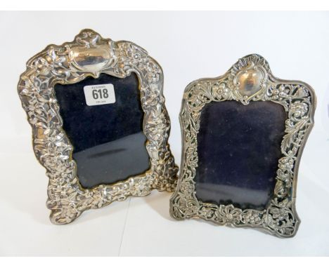 Two ornate Victorian silver photograph frames, tallest of which measures 23cm  The easel fitting on the smaller need attentio