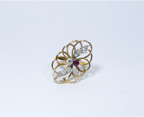 Unusual ruby and diamond floral spray cocktail ring, on 18ct yellow gold openwork setting and shank. Ring size M. 7.8 grams  