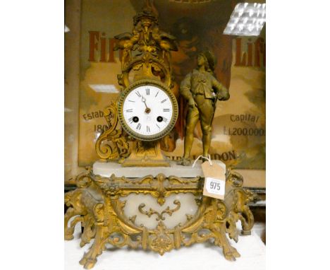 A white marble and gilt figure decorated French striking mantel clock 