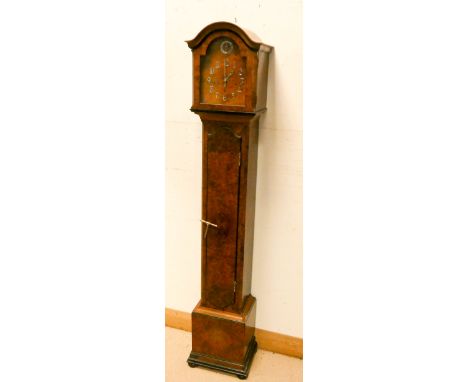 A Westminster chiming grandmother clock in a burr walnut case   Height 65 inches approx