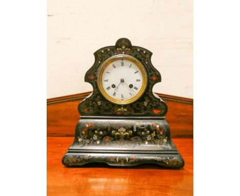 Late Victorian striking mantel clock in ebonised and inlaid style case  