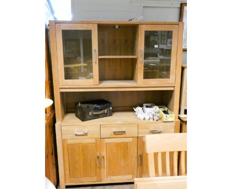A heavy good quality light oak dresser with glazed and shelf back, drawers and cupboards under 4'6 wide 