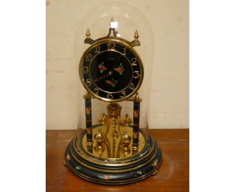 A 400 day clock under glass dome 