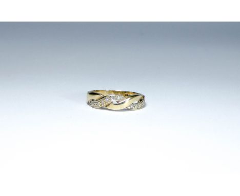 9ct yellow gold wedding band set with diamonds in a twisted design, ring size K, weight 1.9 grams