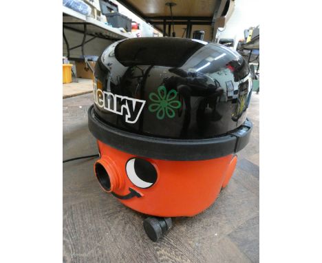 A Numatic Henry Hoover with a new set of tools 