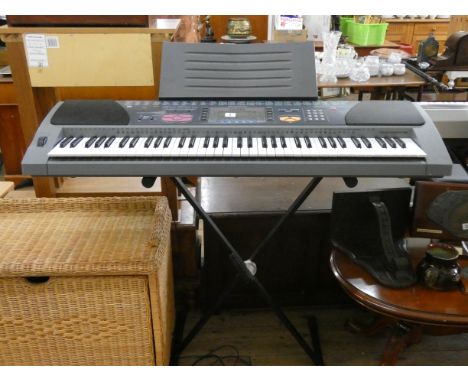 A Casio WK/1200 keyboard on stand 