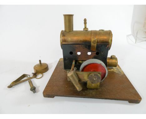 An old brass Steam Engine model 15cms tall 