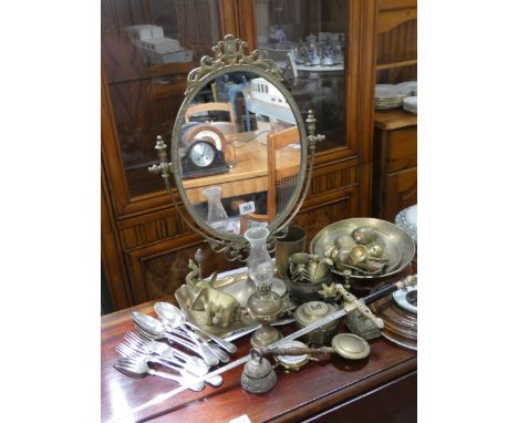 A brass dressing table mirror, small brass ornaments, barometer, Toledo sword, spoons and forks etc 