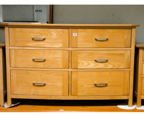 A good quality heavy, light oak, bow front chest fitted six drawers with stainless steel handles, 4'9 wide 