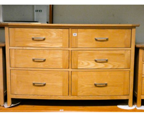 A good quality heavy, light oak, bow front chest fitted six drawers with stainless steel handles, 4'9 wide 