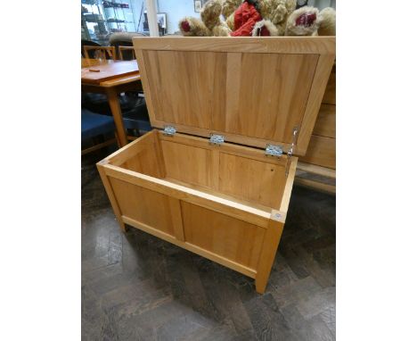 A heavy light oak finished blanket chest, 3' wide 