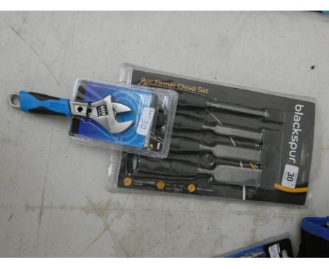 A new four piece chisel set and a new adjustable wrench 