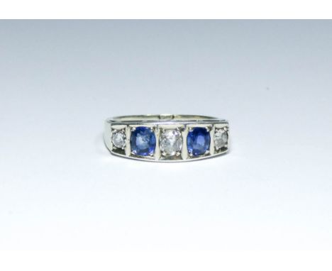 An Art Deco five stone diamond and sapphire ring set in white metal, ring size O, approximate weight 3.2g