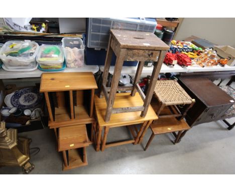 A nest of two pine occasional tables, a vintage side table, string top stool, a pine stool, 2 CD storage units