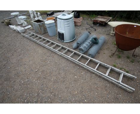 A double extending aluminium ladder