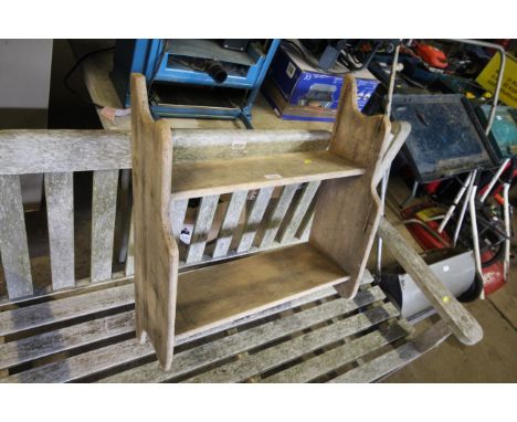 A pine two tier wall hanging shelf