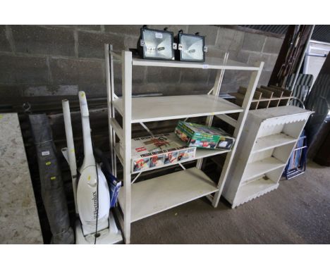 A white painted four tier shelf unit