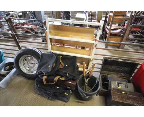 A wooden clothes airer, a wooden folding shelf unit, a quantity of various holdalls, travel cases and three plastic buckets w
