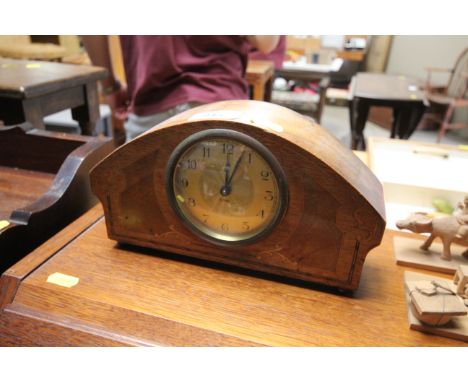 An eight day mantel clock