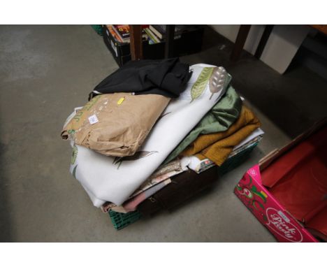 A box of various material and curtains