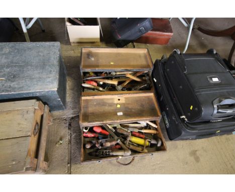 Two wooden carpenters tool boxes and contents of tools to include smoothing plane, hammers, hand braces, chisels etc.