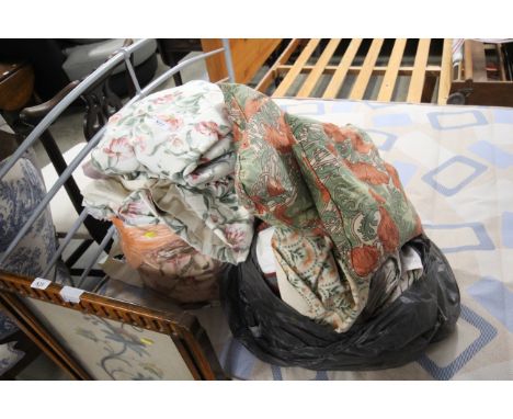 Two bags of various curtains and cushions 