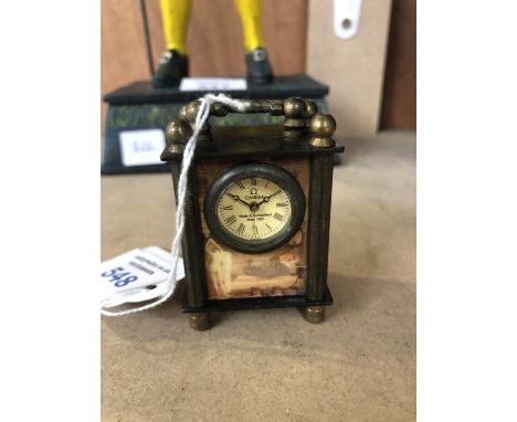 A MINIATURE CARRIAGE CLOCK WITH NUDE SCENES 