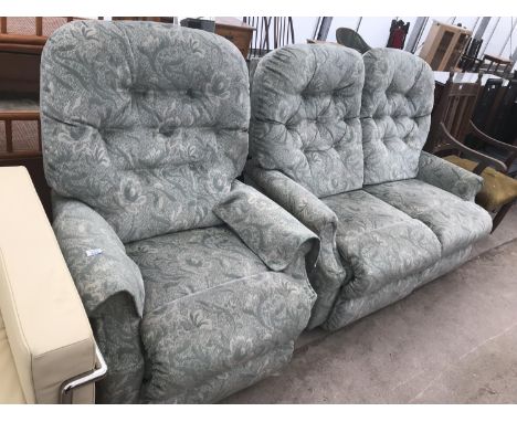A LA-Z-BOY RECLINING TWO SEATER SOFA AND ARMCHAIR 