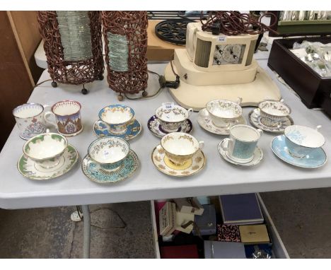 A COLLECTION OF 'ROYAL COLLECTION' CERAMIC CUPS AND SAUCERS 
