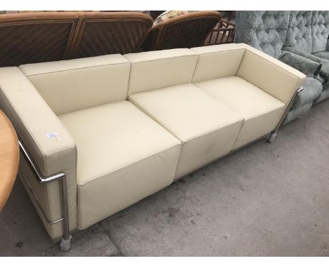 A MODERN 'LE CORBUSIER' CREAM ITALIAN LEATHER THREE SEATER SOFA ON TUBULAR CHROME SUPPORTS 210 CM X 78 CM X 67 CM HIGH 
