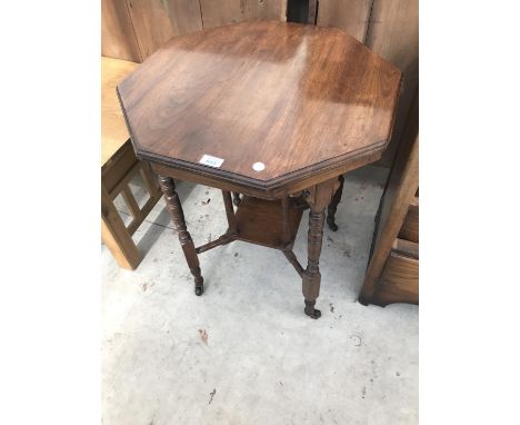 AN OCTAGONAL MAHOGANY SIDE TABLE WITH GALLERIED LOWER SHELF 